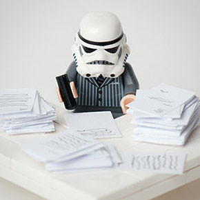 LEGO Stormtrooper in a suit working at a desk